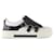 Alexander McQueen White Leather Sneakers With Black Buckle Flap  ref.655924