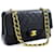 Chanel Classic gefütterte Klappe 10"Chain Shoulder Bag Black Lambskin Schwarz Leder  ref.657625