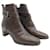 Botines Hermès en piel marrón con correa cruzada al tobillo con hebilla Castaño Cuero  ref.659224