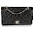 Timeless Chanel Black Quilted Lambskin Medium Classic Double Flap Bag  Leather  ref.659308