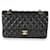 Timeless Chanel Black Quilted Lambskin Medium Classic Double Flap Bag  Leather  ref.659313