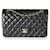 Timeless Chanel Black Quilted Lambskin Medium Classic Double Flap Bag  Leather  ref.659430