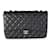 Timeless Chanel Black Quilted Caviar Jumbo Classic Single Flap Bag  Leather  ref.667667