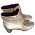 Avril Gau botas de cuero doradas Dorado