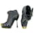 Alexander McQueen ankle boots in black leather with brass square toe caps  ref.698444
