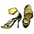Prada-Sandalen aus schwarzem Leder mit metallischem Goldbesatz und Knöchelriemen  ref.698447