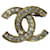 Broche Chanel CC en strass dorés Métal  ref.710304