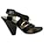 Sandalias de charol negro con hebilla de marca de Dolce & Gabbana  ref.726224