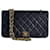 Classique Chanel plein rabat cuir d'agneau noir vintage 23 matériel d'or intemporel  ref.730826