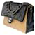 Classique Ravissant Sac Chanel Timeless Medium série limitée single flap bag en cuir d'agneau matelassé bicolore noir & beige  ref.748796