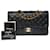 Die ikonische „Must have“ Chanel Timeless Medium Bag 25 cm mit gefütterter Klappe aus schwarzem gestepptem Lammfell Leder  ref.758861
