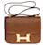 Hermès Excepcional bolso de hombro Hermes Constance 23 Avestruz Avellana Caramelo Cuero de avestruz  ref.763854