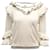 Maje Moreno Top in maglia con volant a balze in poliestere color crema Bianco Crudo  ref.773275