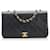 Bolso Chanel Matelasse con solapa y cadena Negro Piel de cordero  ref.774516