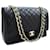 CHANEL Maxi Classic Handbag Grained calf leather lined Flap Chain Shoulder Bag Black  ref.791228
