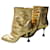 CHANEL Stiefeletten aus goldfarbenem Leder mit Krokoprägung T41 Sehr guter Zustand Golden  ref.795471