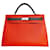 Hermès Kelly 40 Zweifarbiges Saddle Fire / Zinn Orange Leder  ref.802154