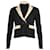 Cardigan corto in maglia a contrasto Sandro Paris in viscosa beige e nera Nero Fibra di cellulosa  ref.869131