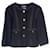 Pequeña chaqueta de tweed negra de Chanel Negro  ref.873846