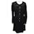 VINTAGE CHANEL DRESS CAMELIA BUTTONS & BOW IN BLACK WOOL 42 L WOOL DRESS  ref.894570