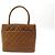 Medaillon BOLSA DE MÃO DE COURO CHANEL CABAS SHOPPING MEDALHÃO MARROM ACOLCHOADA - vista 2