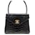 VINTAGE CHANEL MINI FLAP HANDBAG WITH TIMELESS CLASP IN BLACK CROCODILE LEATHER BAG Exotic leather  ref.915796