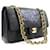 Solapa forrada Chanel Classic 10Bolso de hombro con cadena de piel de cordero negro Cuero  ref.920369