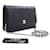 CHANEL Black Camellia Embossed Wallet On Chain WOC Shoulder Bag Leather  ref.920371