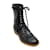 Chanel Combate de cuero negro con botas de detalle Brogue/botines  ref.938420