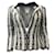 Chanel Ivoire / Blazer noir en tweed avec col en velours Coton Écru  ref.939482
