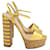 Sandália plataforma com tira no tornozelo Gucci em couro dourado Metálico  ref.954868