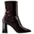 Botins Donna - Carel - Couro Envernizado - Marrom/Cor preta  ref.960456