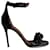 Sandali con cinturino alla caviglia decorati Givenchy in pelle verniciata nera Nero  ref.967229