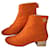 Chanel Paris-Salzburg Orange TextileQuilted Gold Heel Ankle Boots Wool  ref.970269