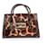 Dolce & Gabbana, Sac à main en cuir marron et imprimé girafe en poil de veau.  ref.1002000