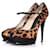 YVES SAINT LAURENT, Leopard printed calf tributes. Brown Leather  ref.1003568