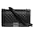 Chanel black medium boy bag Leather  ref.980811