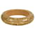 Bracelet jonc Louis Vuitton beige avec inclusions d'or et sequins en résine  ref.994697