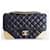 Timeless Chanel Classic medium bag Black Leather  ref.1021150