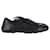 Prada niedrige Sneakers aus schwarzem Leder  ref.1053003