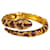 Kenneth Jay Lane Pulsera abierta con forma de serpiente y diamantes de imitación esmaltados en oro Dorado Metal  ref.1064337