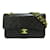 Chanel Bolso mediano con solapa con forro clásico Negro Cuero  ref.1110572