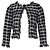 Timeless Chanel Chaqueta de tweed y encaje en blanco y negro