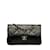 Chanel Kleine klassische gefütterte Überschlagtasche Schwarz Leder Kalbähnliches Kalb  ref.1129851