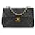 Solapa con forro de piel de cordero Black Jumbo Classic de Chanel Negro Cuero  ref.1133245