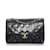 Petit sac à rabat classique doublé en cuir d'agneau noir Chanel  ref.1135131