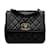 Bolsa Chanel preta acolchoada em pele de cordeiro XL com aba quadrada Preto Couro  ref.1150260