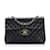 Bolso de hombro con solapa y forro de piel de cordero Chanel Jumbo Classic negro Cuero  ref.1150555