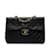 Sac à bandoulière à rabat doublé en cuir d'agneau Chanel Maxi Classic noir  ref.1151379
