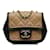 Bolso bandolera con solapa y gráfico cuadrado mini Chanel marrón Castaño Cuero  ref.1164790